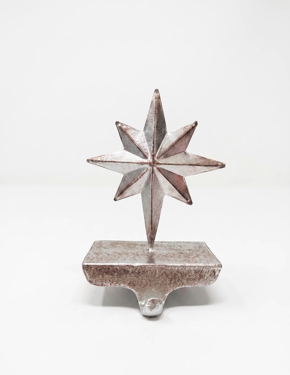 Sujeta bota navideña forma estrella Sujeta bota navideña forma estrella